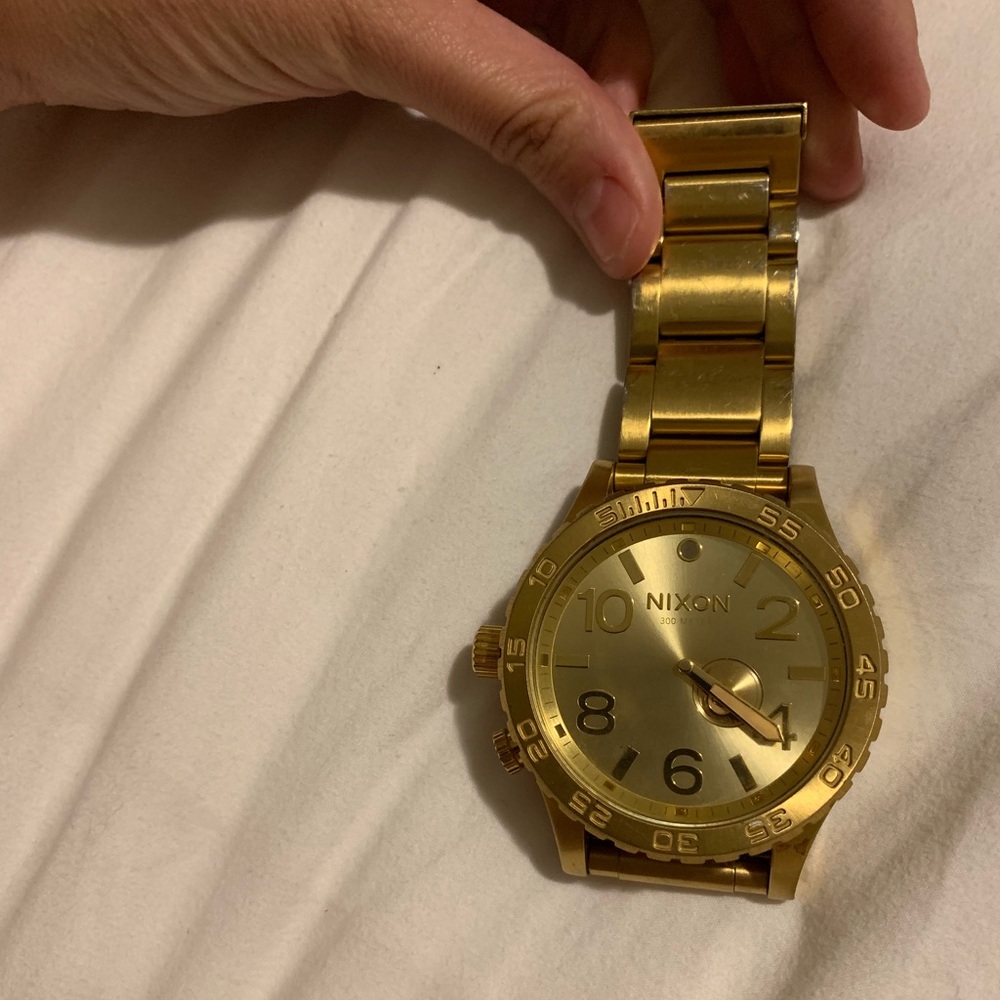 Nixon gold watch